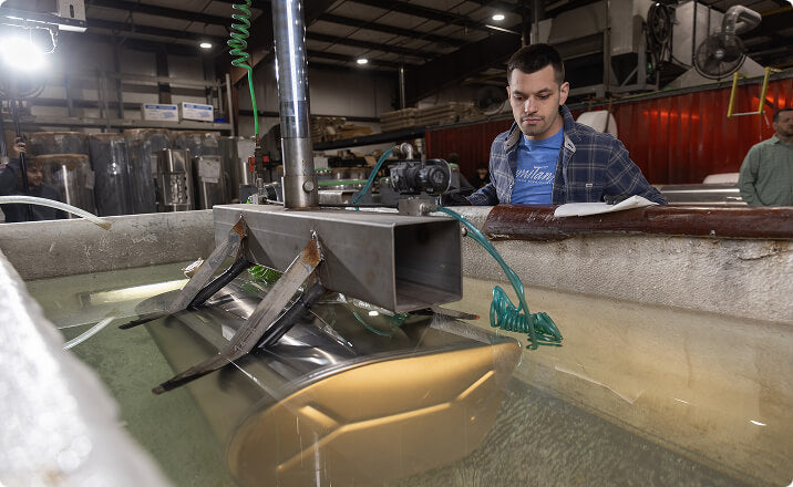 Technician assembling aluminum parts for bus companies