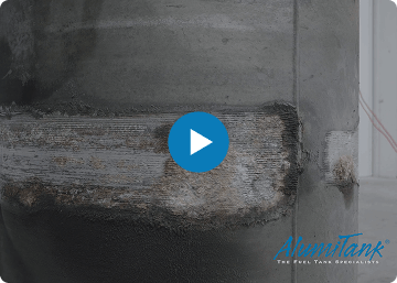 Concrete floor with a play button overlay and Alumilift logo.